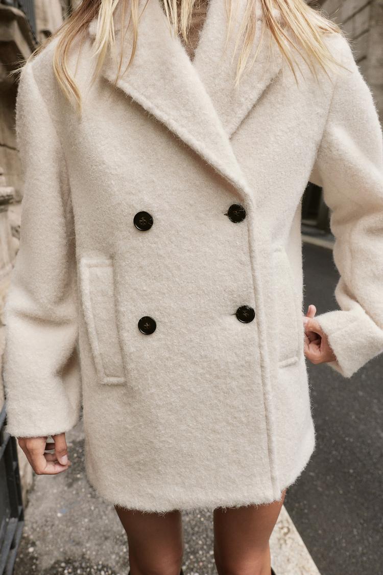 MANTEAU MI-LONG BOUCLÉ À BOUTONNAGE CROISÉ